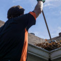 Removing Debris from Gutters: Essential Tips for Roof and Gutter Maintenance